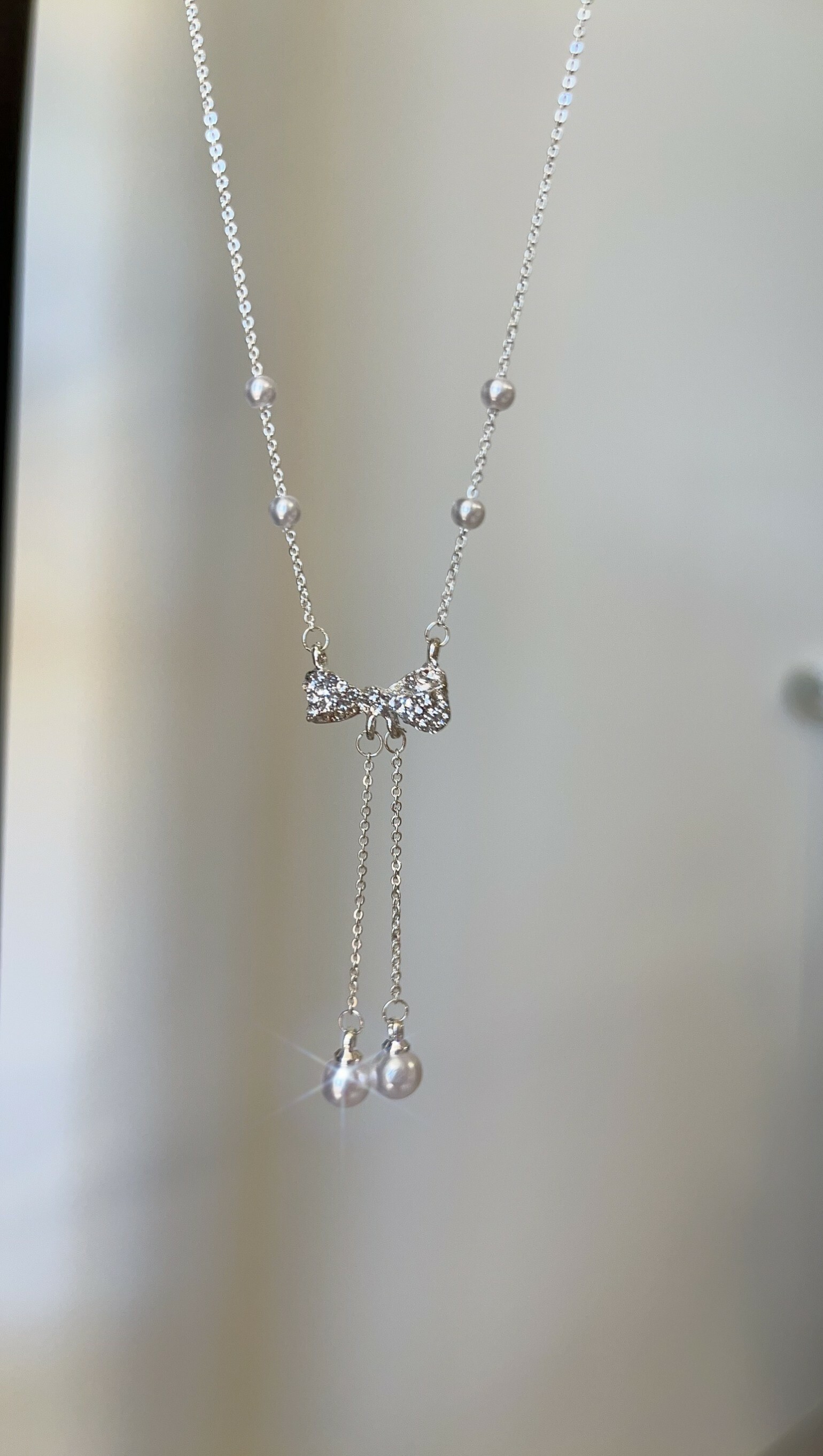 碎鑽蝴蝶結珍珠垂墜純銀項鍊