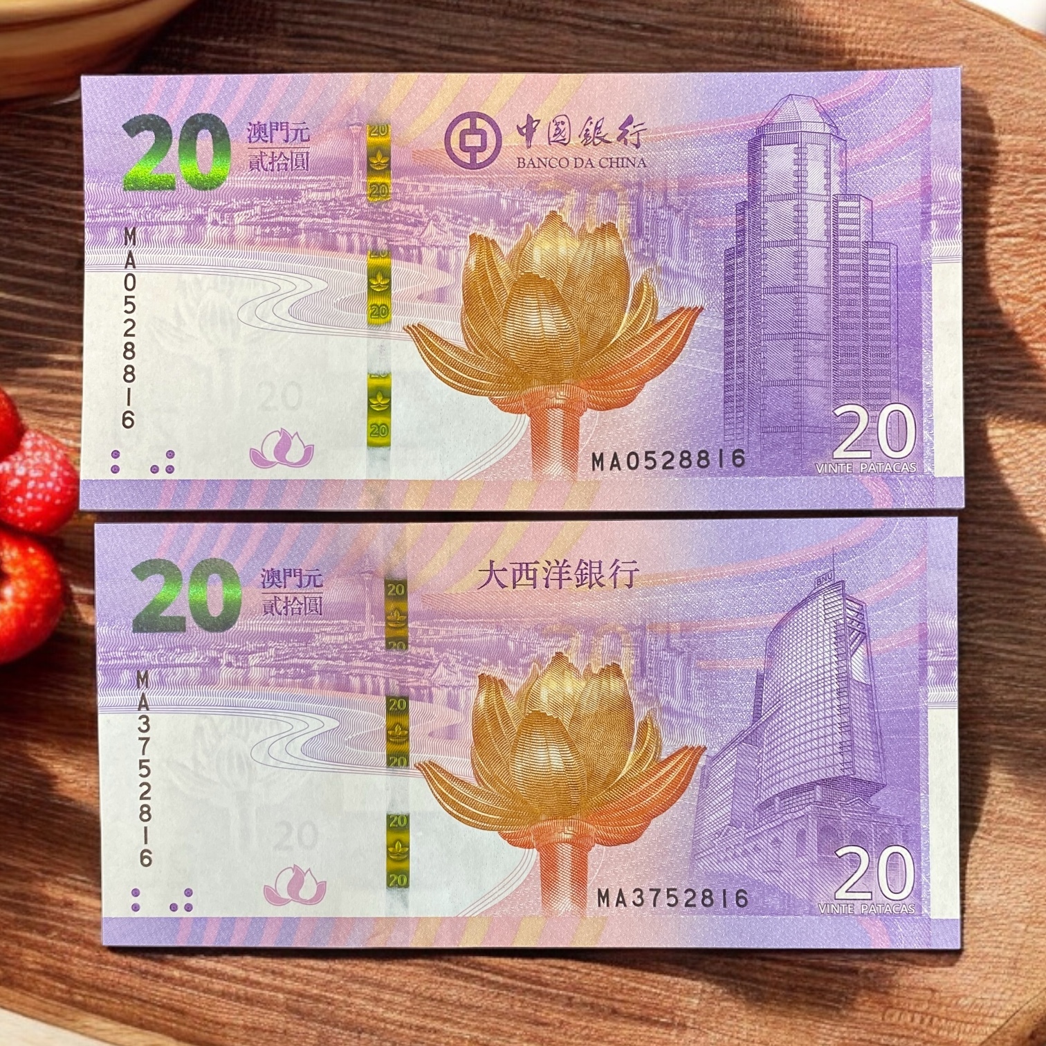 2019, Macau BNU and BOC, a pair of Return of Lotus commemorative banknotes (UNC condition) selling in sequential order
