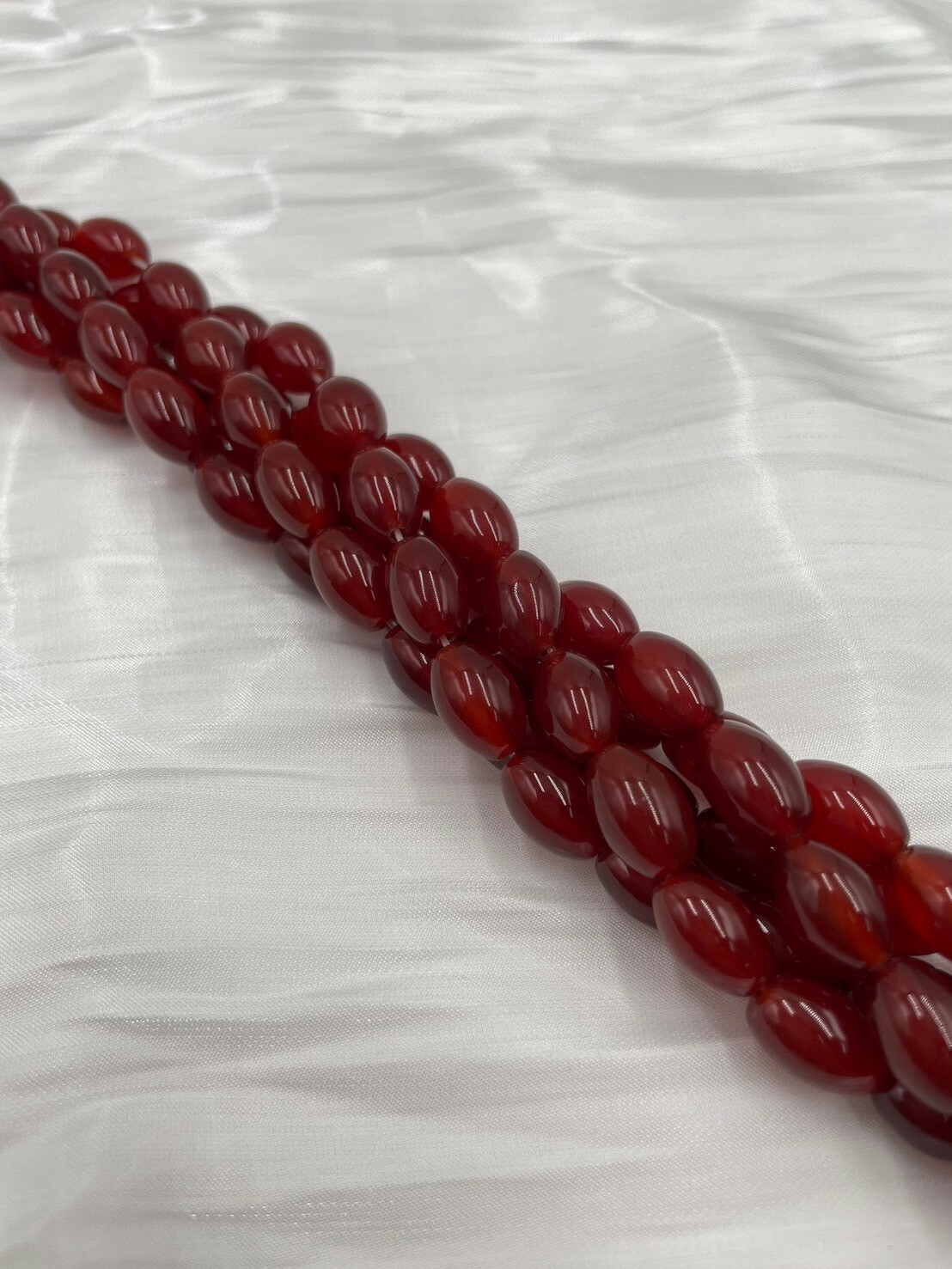 條-No.7亮面橢圓中深瑪瑙珠8mm*12mm約33顆