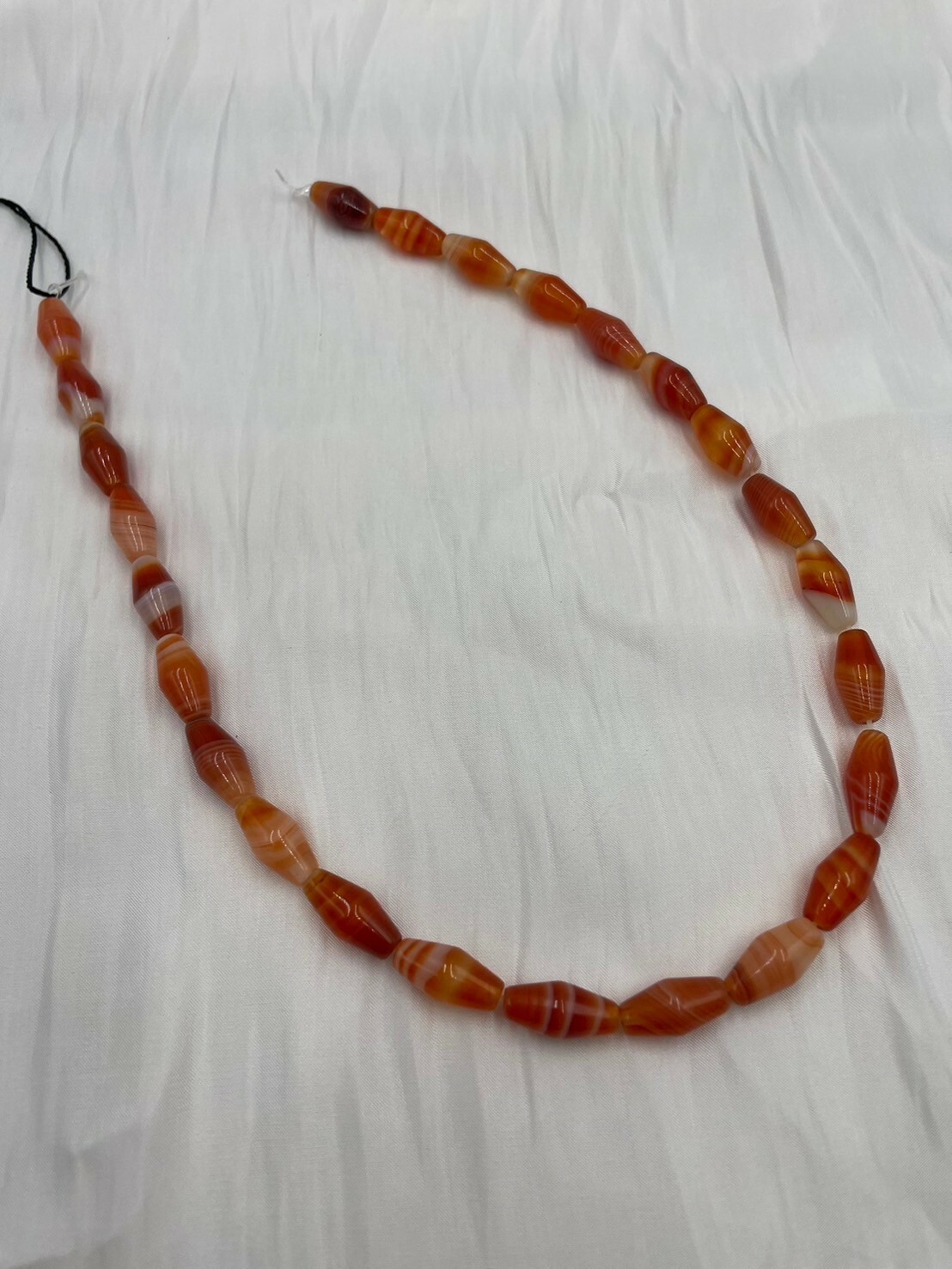 條-No.9亮面長筒菱形瑪瑙珠8mm*16mm約25顆