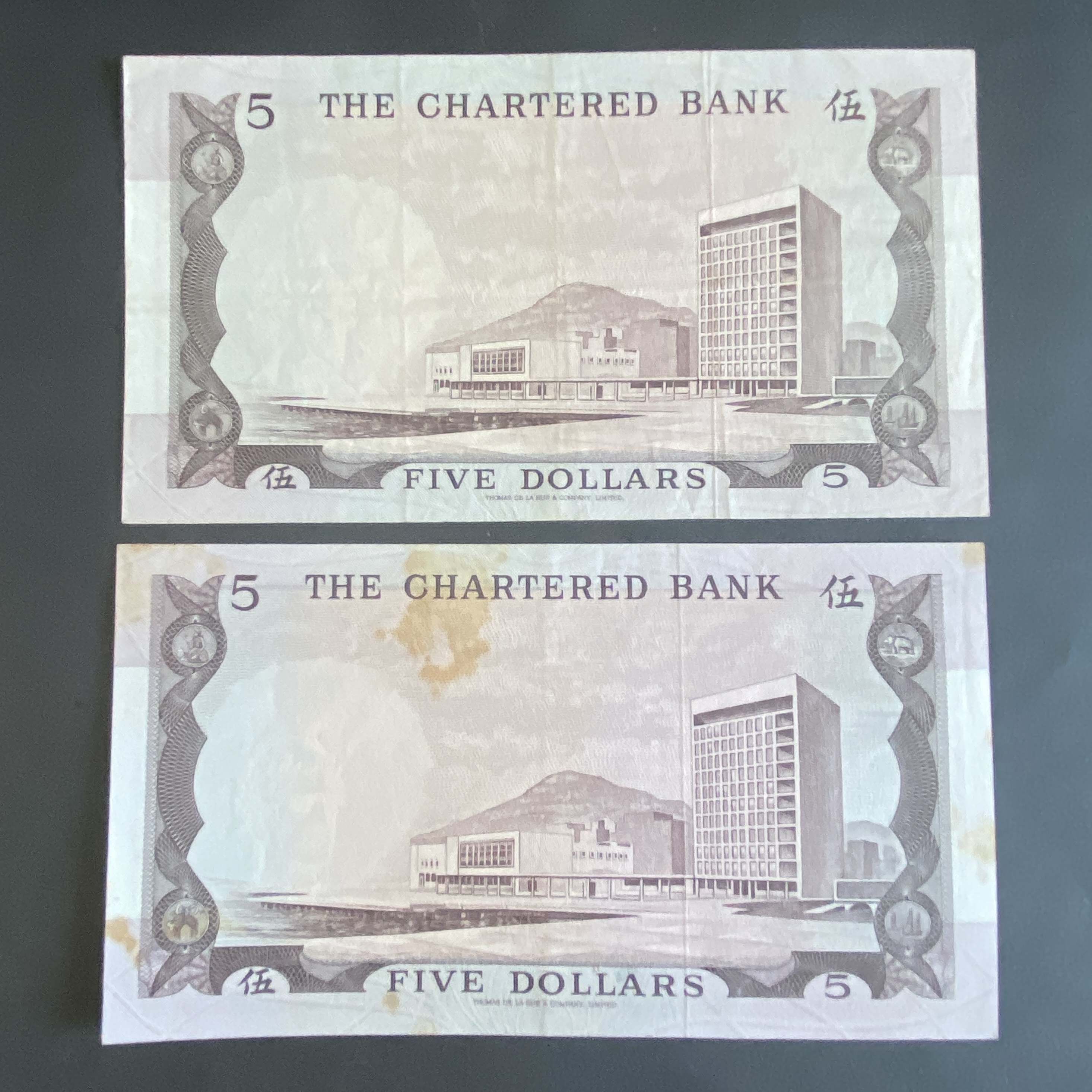 1970-1975, SCB $5 Two "Brown house" banknotes (F - VF condition)