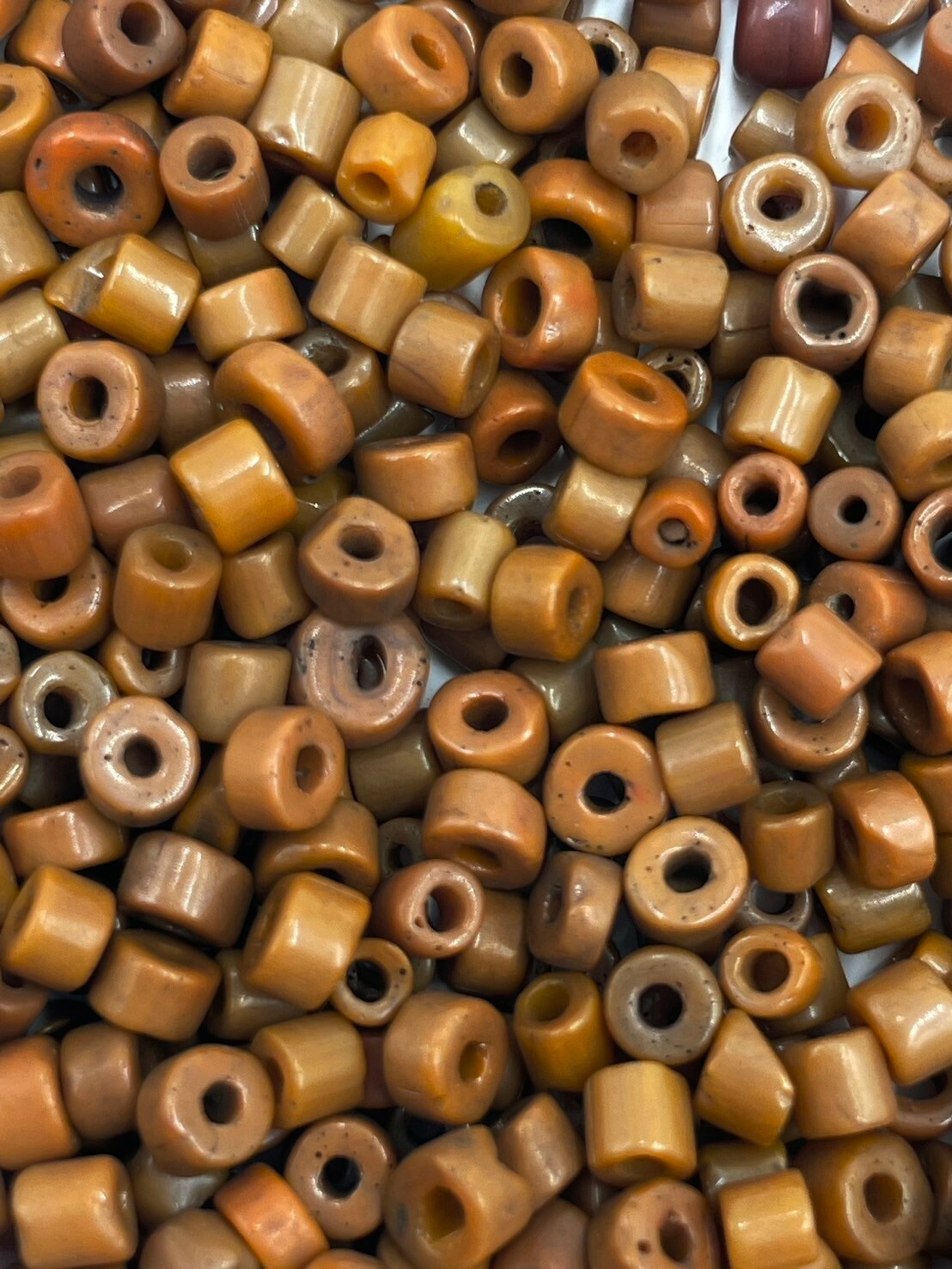 公克-貿易古管橘珠3mm長2mm孔1.5mm