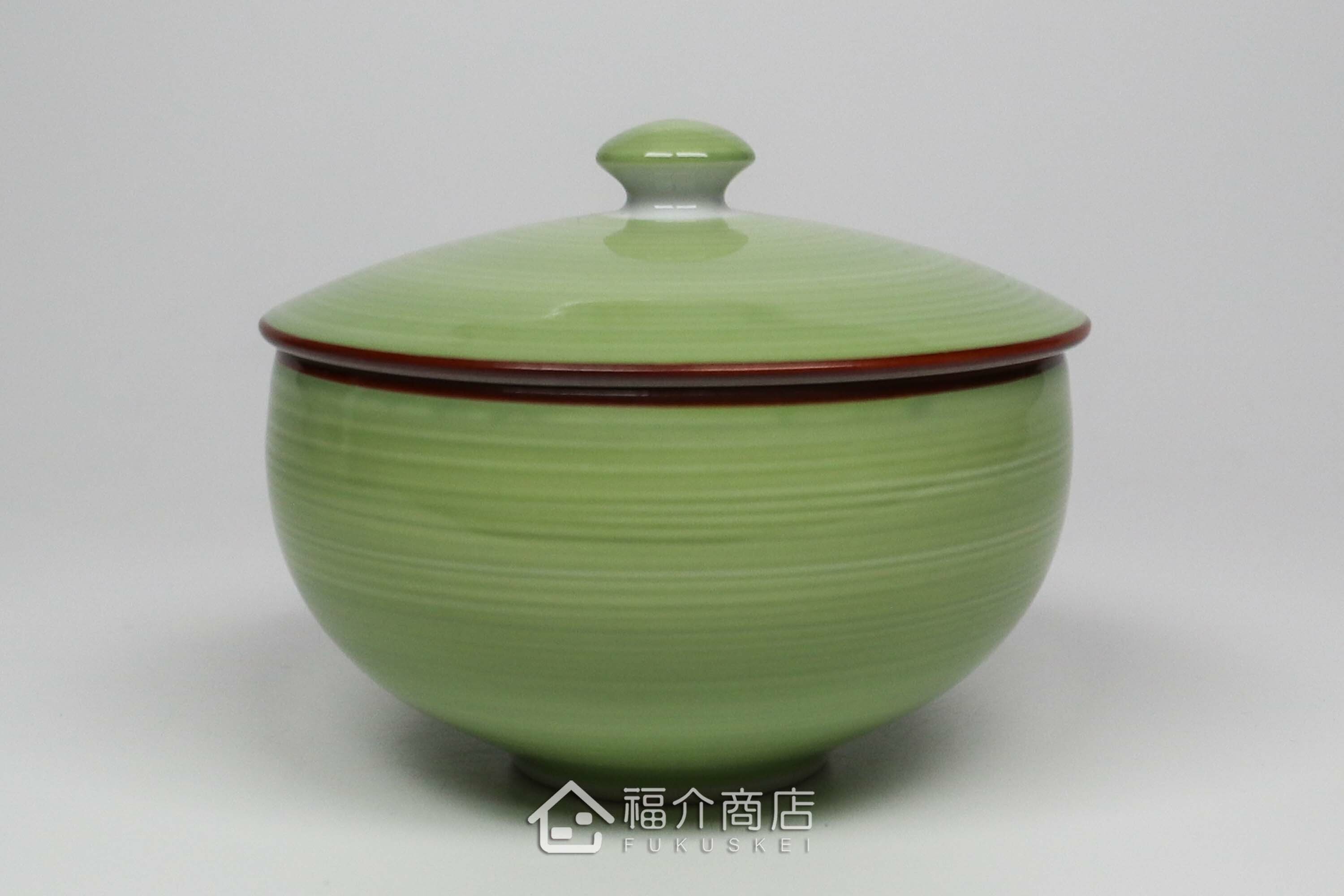 日本陶瓷材質的180cc綠色與白色有蓋茶杯