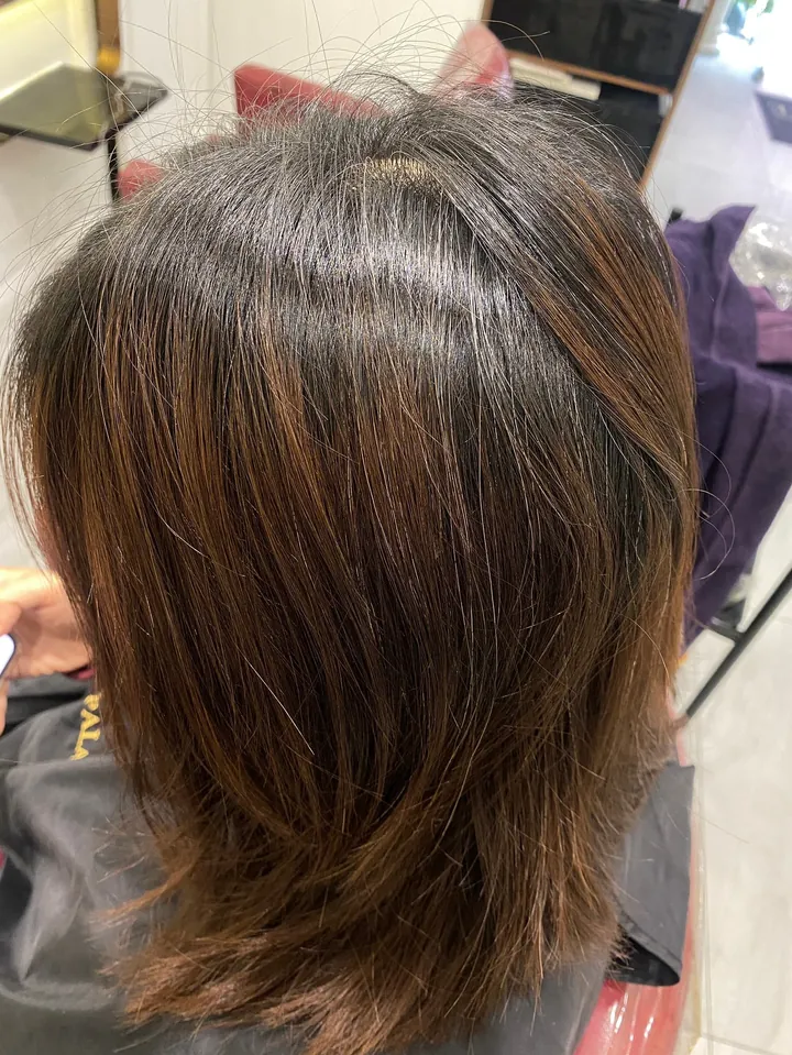 Before-and-after comparison using plant-based dye to correct color build up