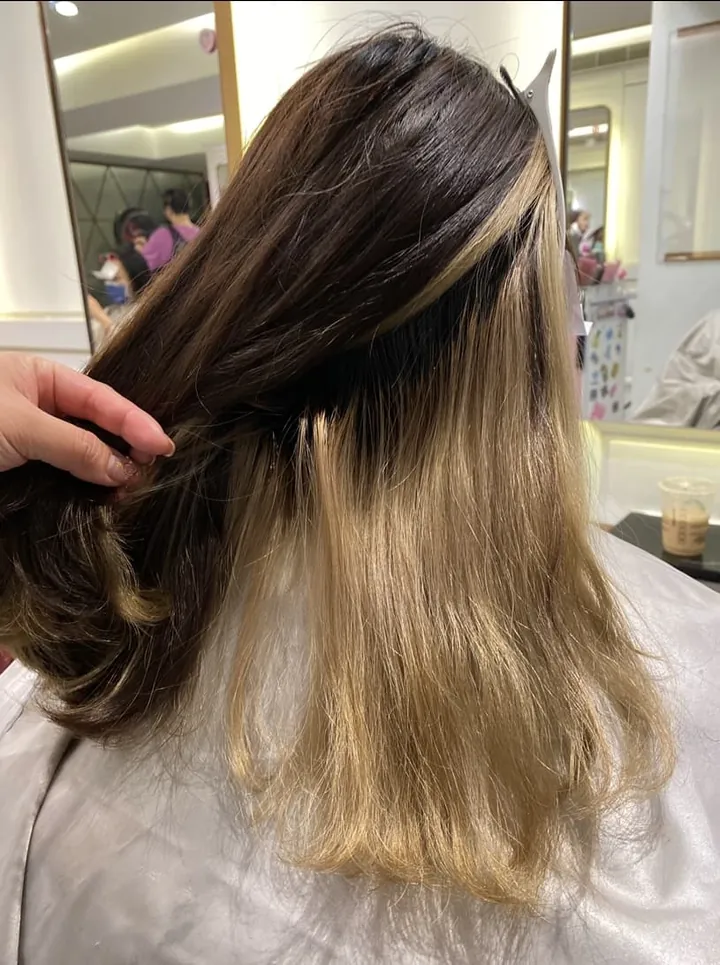 During the hair care phase, use color-depositing shampoo to maintain color after bleaching and fading. Image source: Bella.