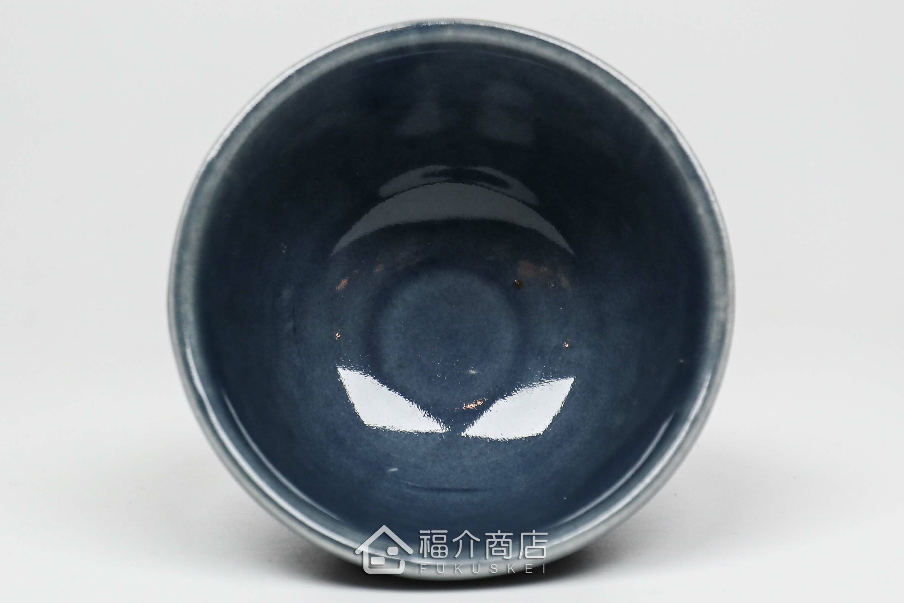 可以盛裝清酒或飲料的八角造型藍色小酒杯