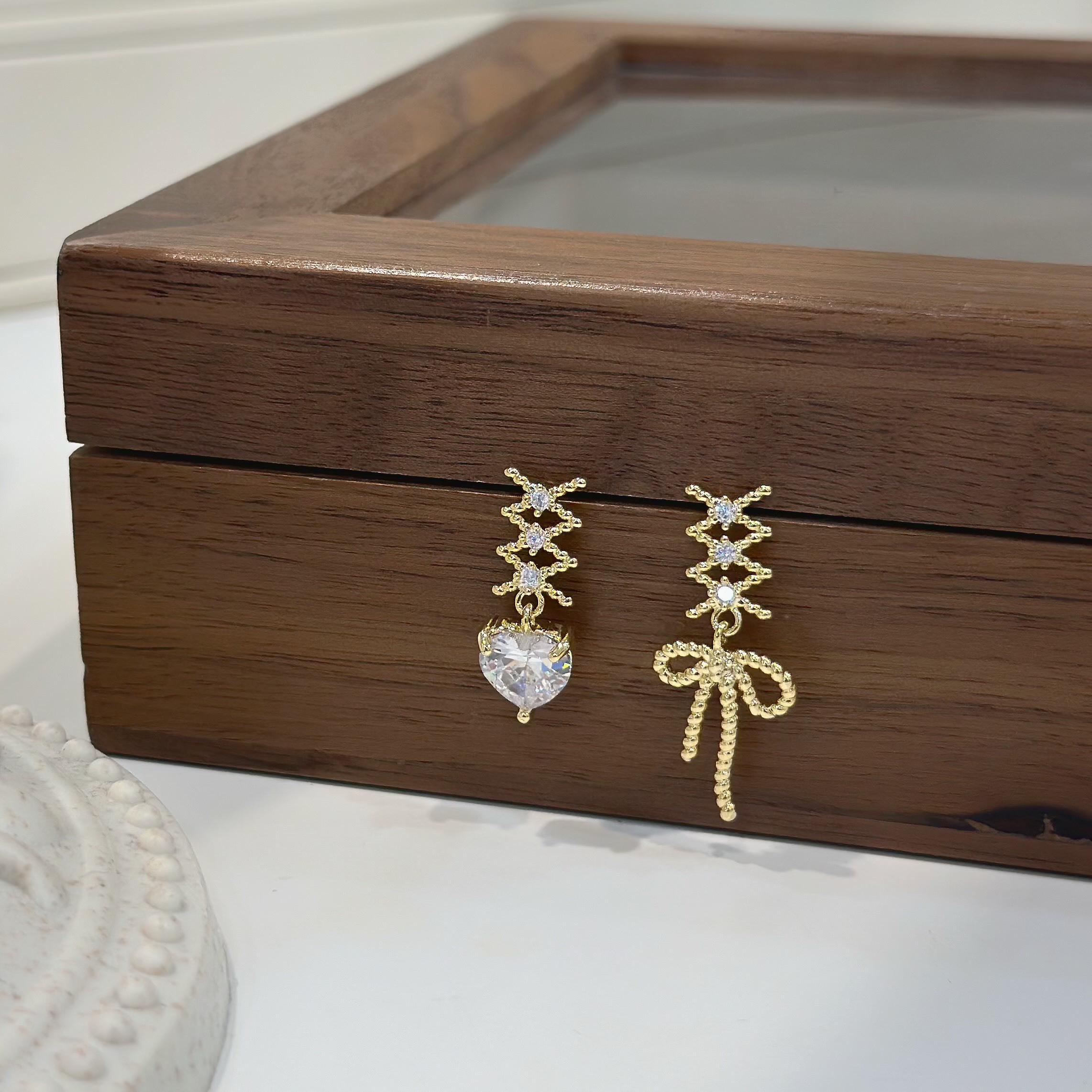 S25交叉緞帶蝴蝶結愛心不對稱垂吊