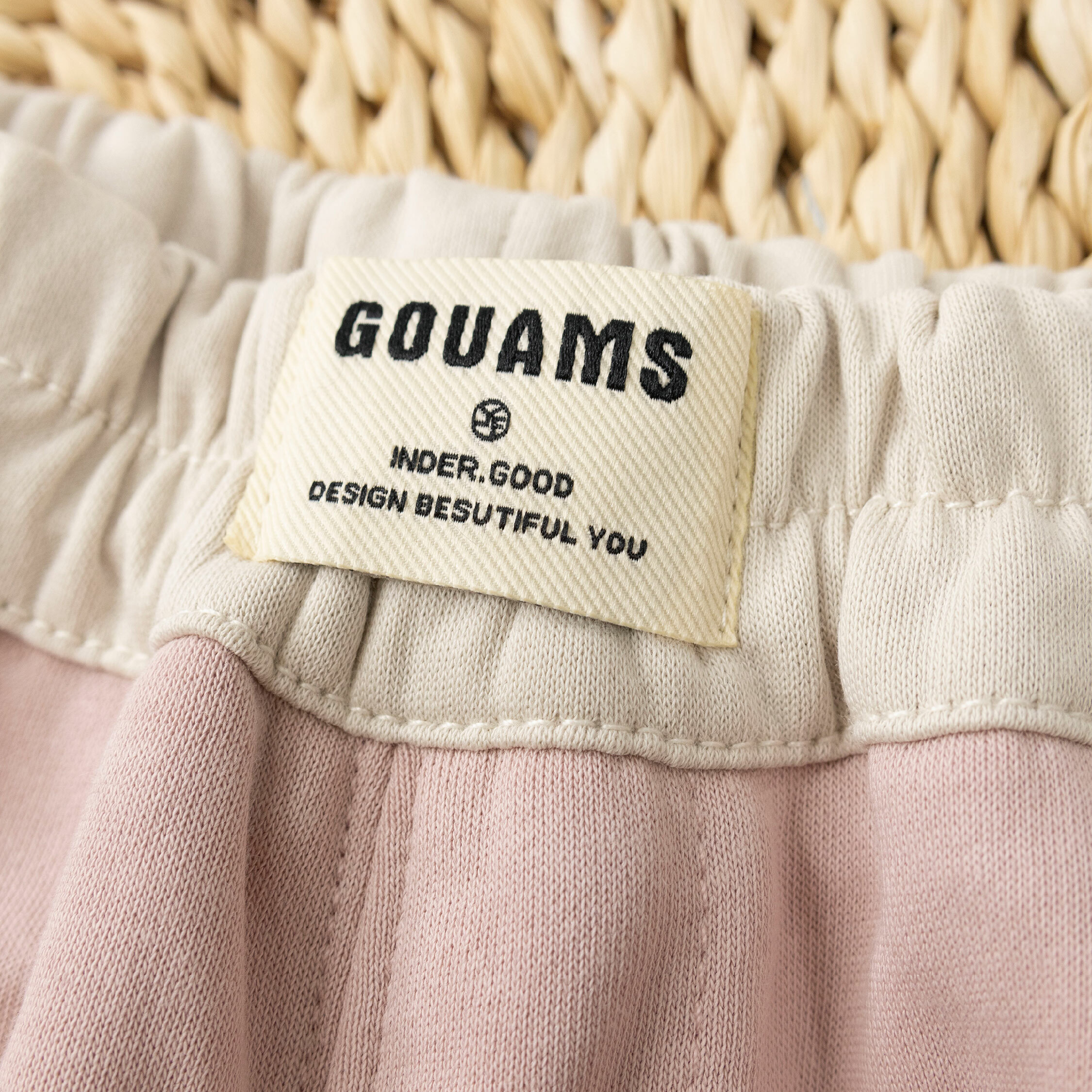 【H35636】雙色拼接英字布標縮口褲