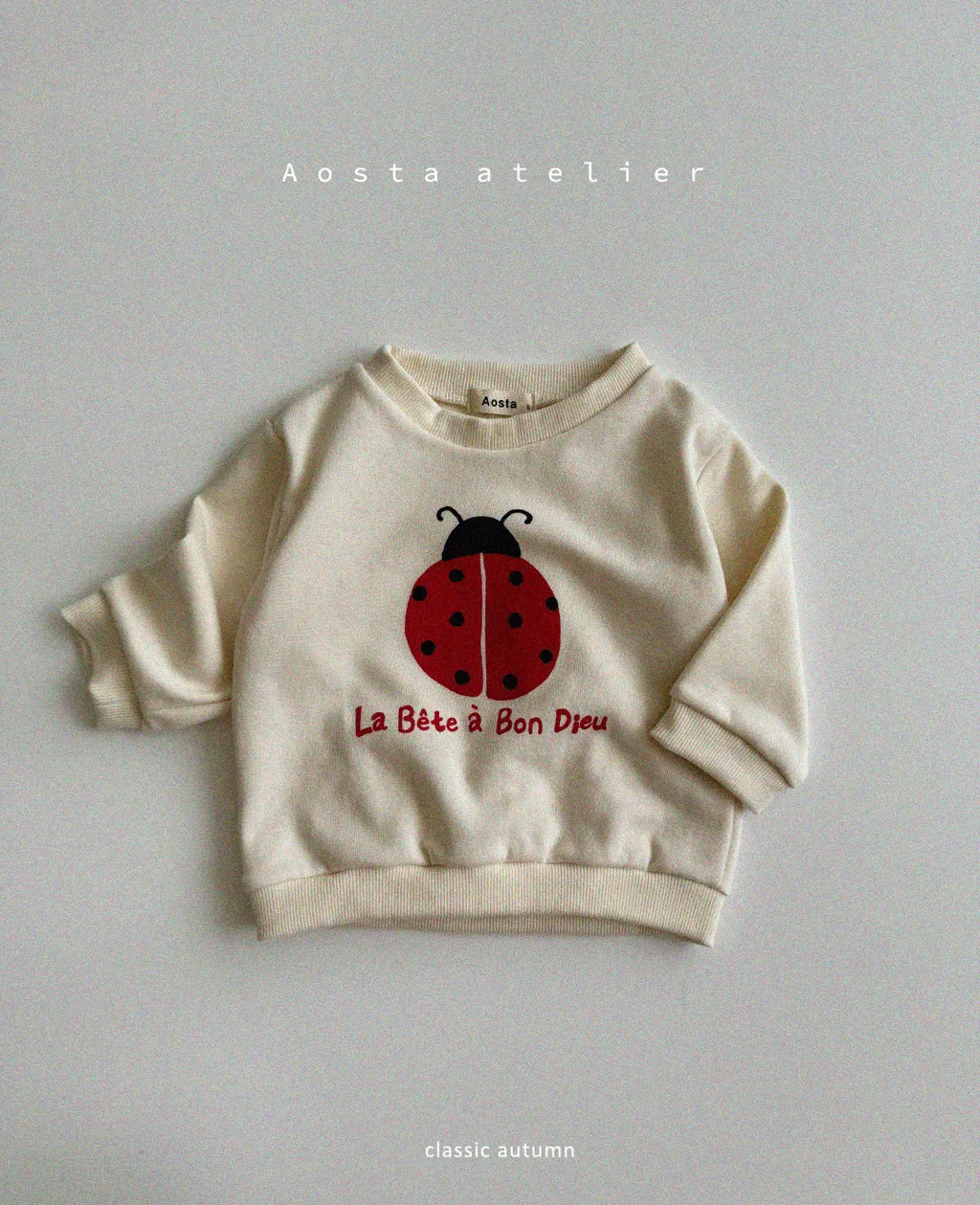 韓國 Aosta-秋款童趣瓢蟲上衣-象牙米