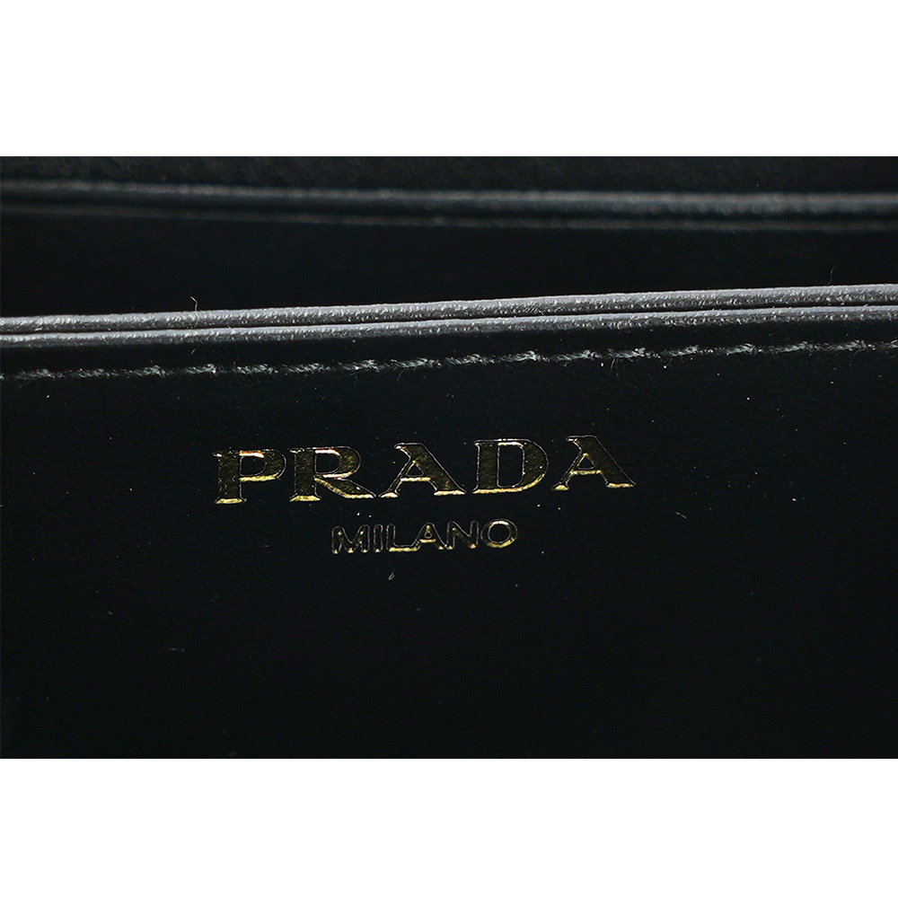 【PRADA】三角牌Logo 水波紋皮革零錢包(黑色) 1MM268 2DDU F0002