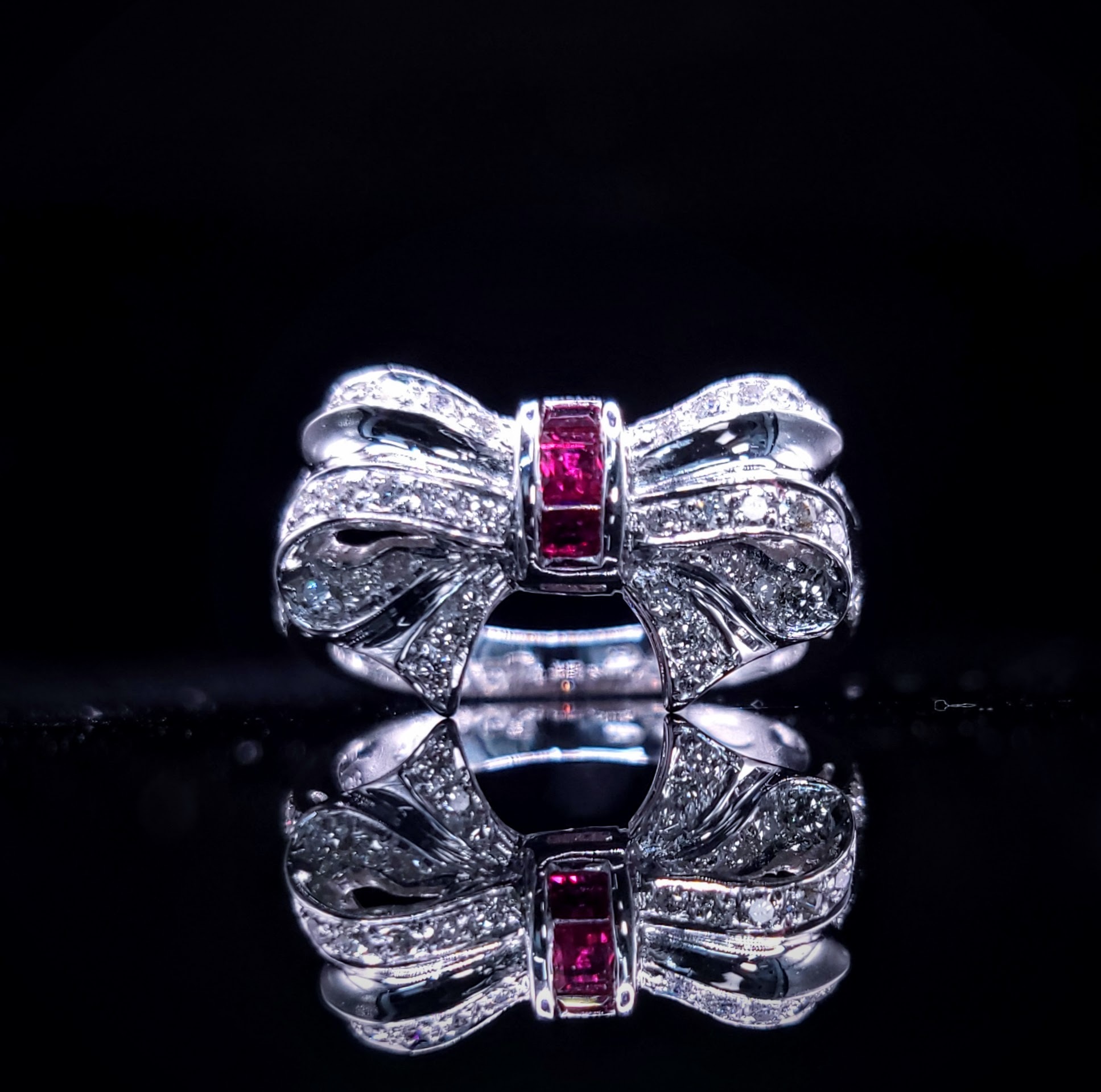 18K White Gold 0.19ct Ruby and 0.38ct Diamond Ring
