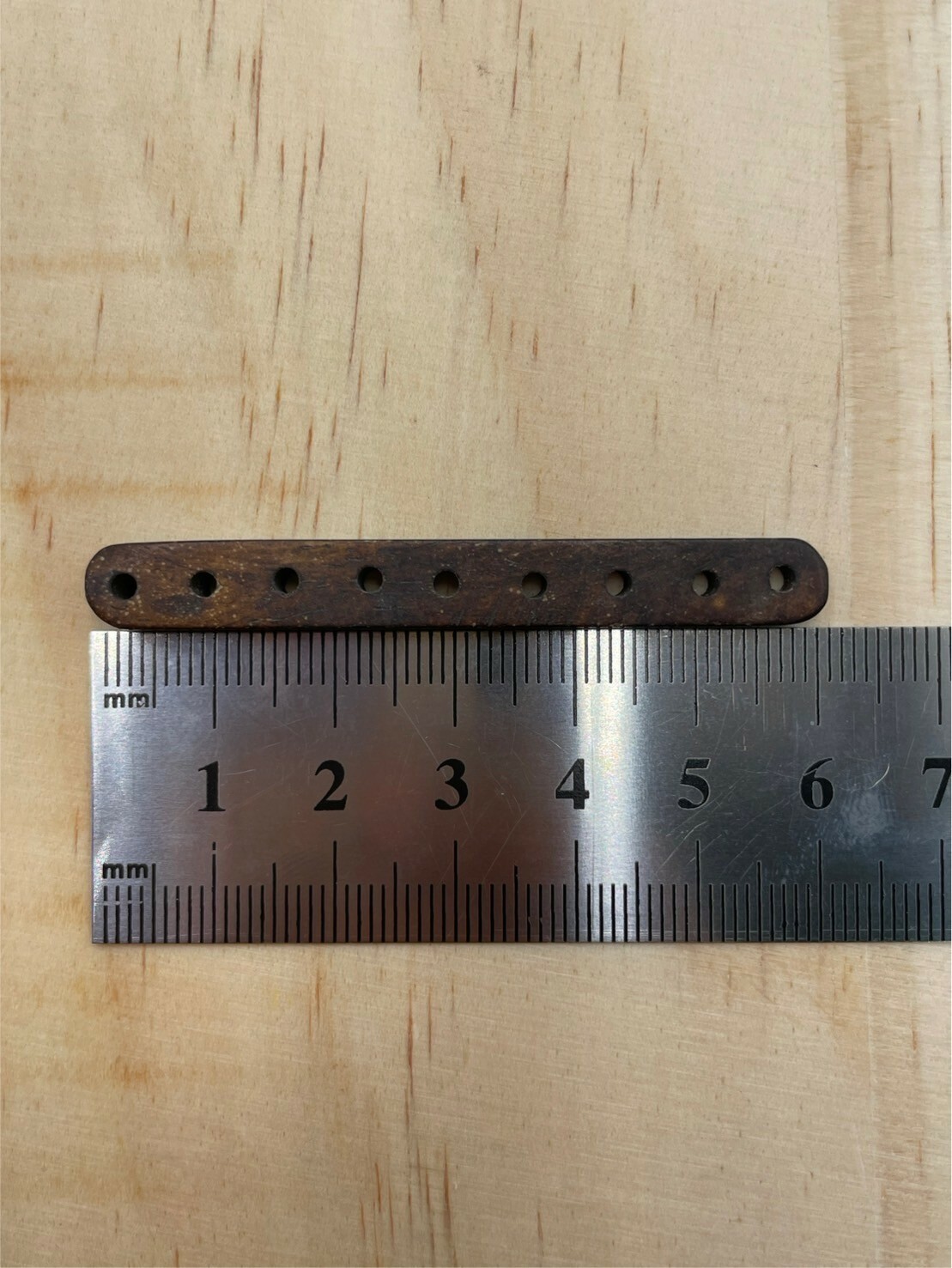 9孔-No.11牛骨窄版深褐隔片長6寬0.8厚0.4