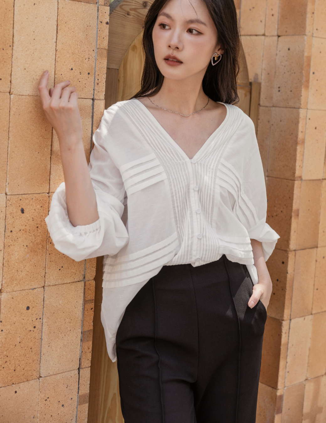 壓褶澎袖長袖上衣