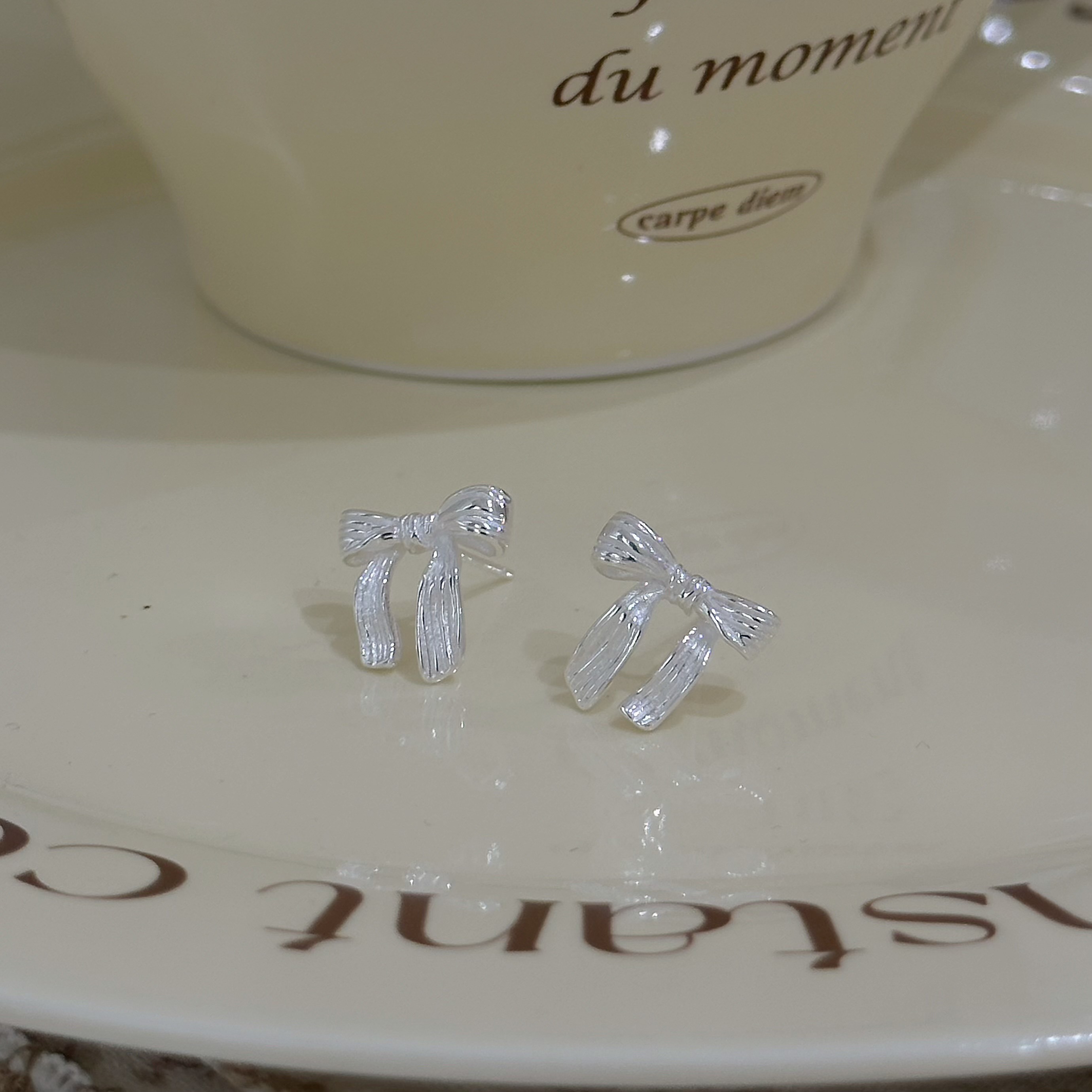 H22壓紋蝴蝶結純銀耳針