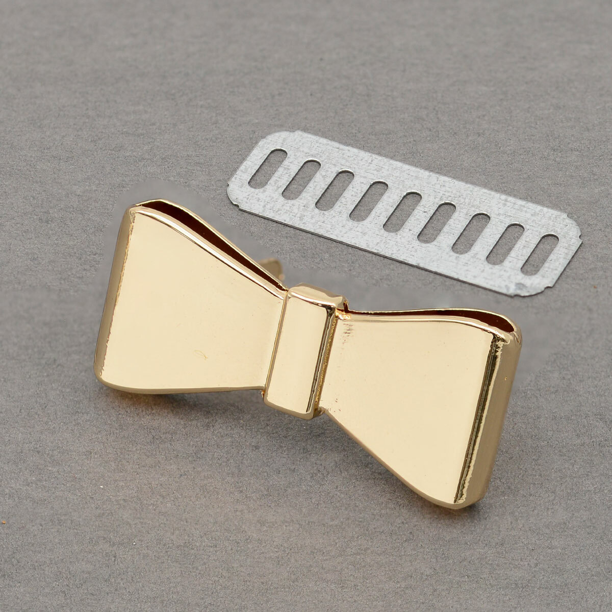 Butterfly-shaped metal tag