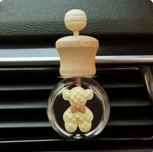 Hot selling car aromatherapy car air conditioner air outlet empty bottle decoration car small ornaments free perfume drops (beige bow bear)