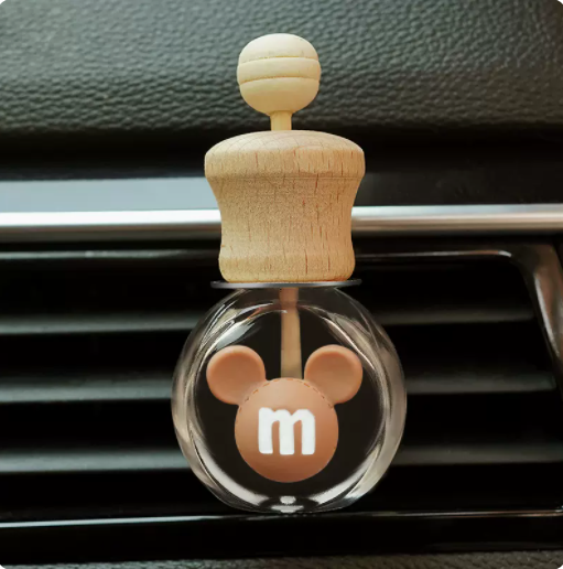 Hot selling car aromatherapy car air conditioner air outlet empty bottle decoration car small ornaments free perfume drops (brown M beans)