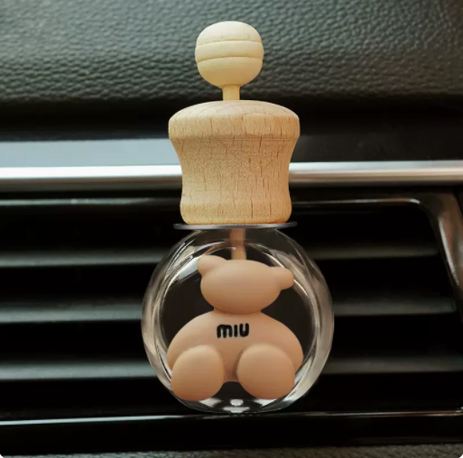 Hot selling car aromatherapy car air conditioner air outlet empty bottle decoration car small ornaments free perfume drops (brown miu bear)