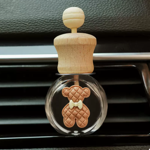 Hot selling car aromatherapy car air conditioner air outlet empty bottle decoration car small ornaments free perfume drops (brown bow bear)