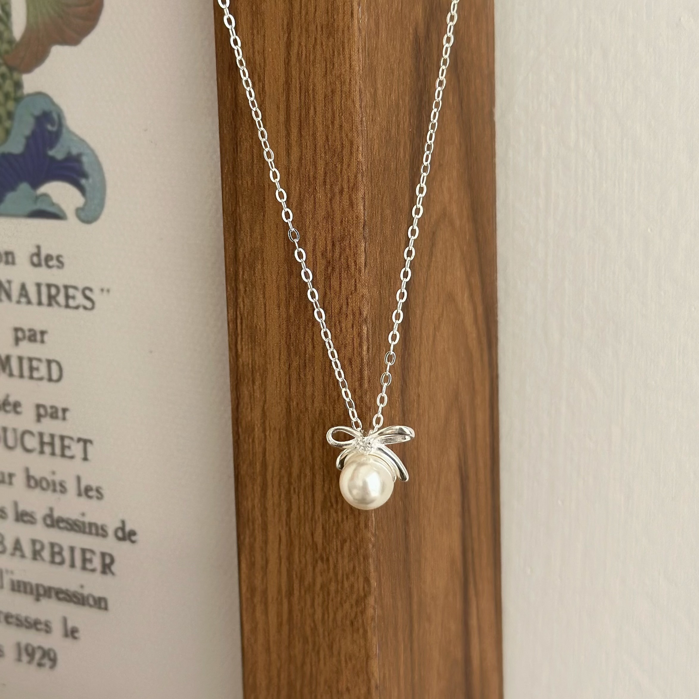 迷人．蝴蝶結珍珠純銀項鍊