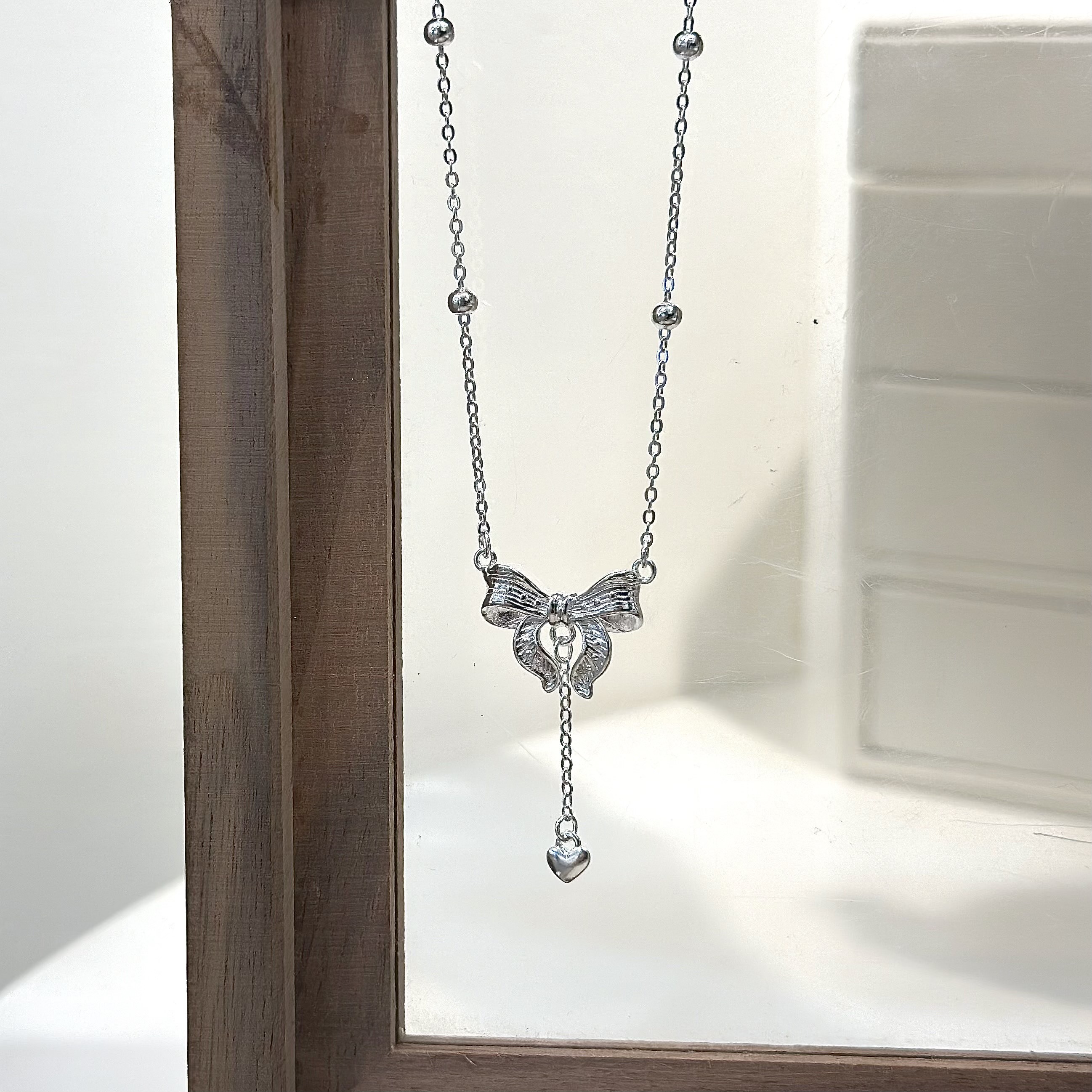 N14切割蝴蝶結圓珠純銀鎖骨鏈