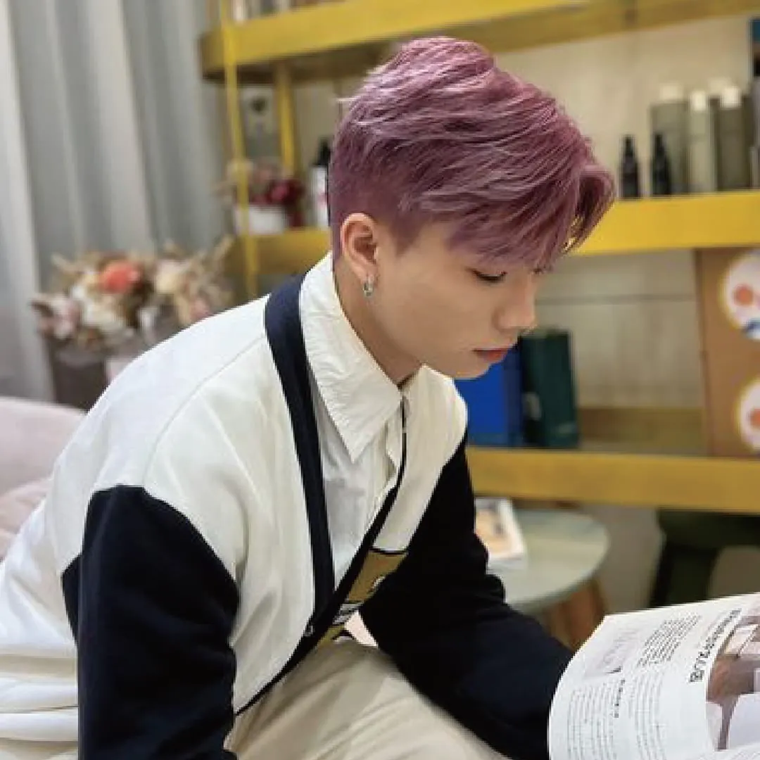 Chris's work on men's light lilac pink hair coloring.