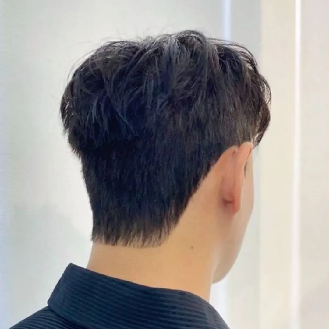 Men's perm: Flat perm. Helps men with longer sideburns prevent them from sticking out.