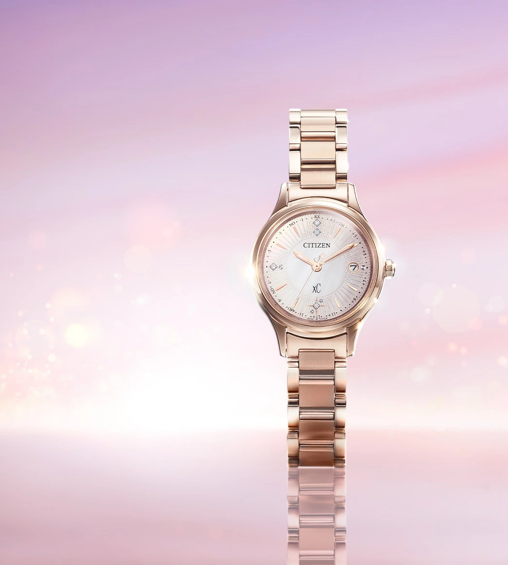 萬年鐘錶 - Citizen 星辰錶  XC   櫻花粉鑽石點綴鈦金屬光動能電波女錶  ES9497-61X  錶徑27MM