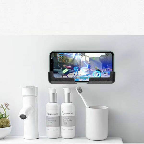 Hot selling car mobile phone holder car adhesive navigation mobile phone holder wall universal multi-purpose
