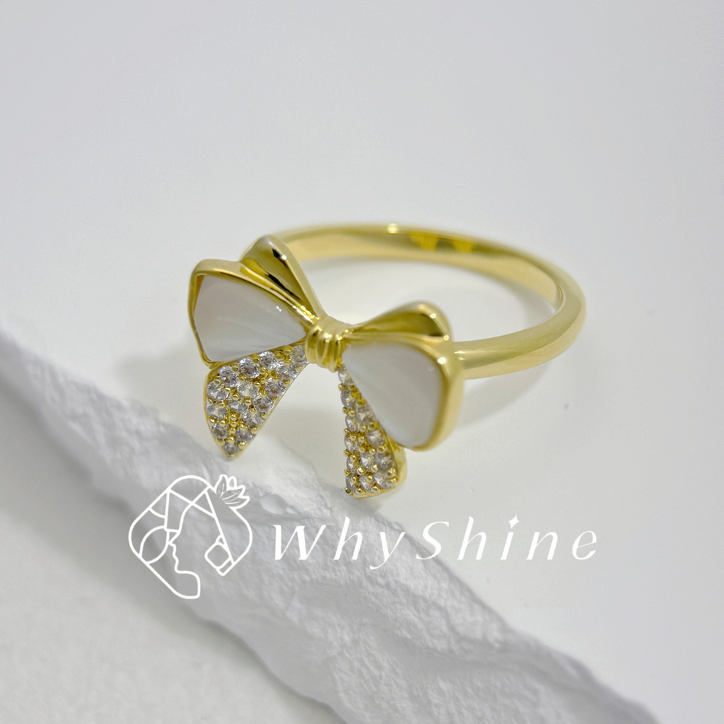大蝴蝶結母貝鑲鑽戒指
