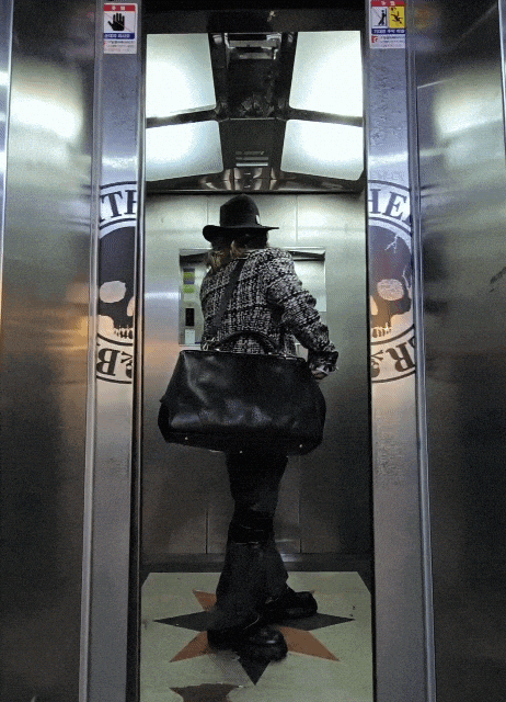 金屬角度黑色皮革波士頓手提側背包