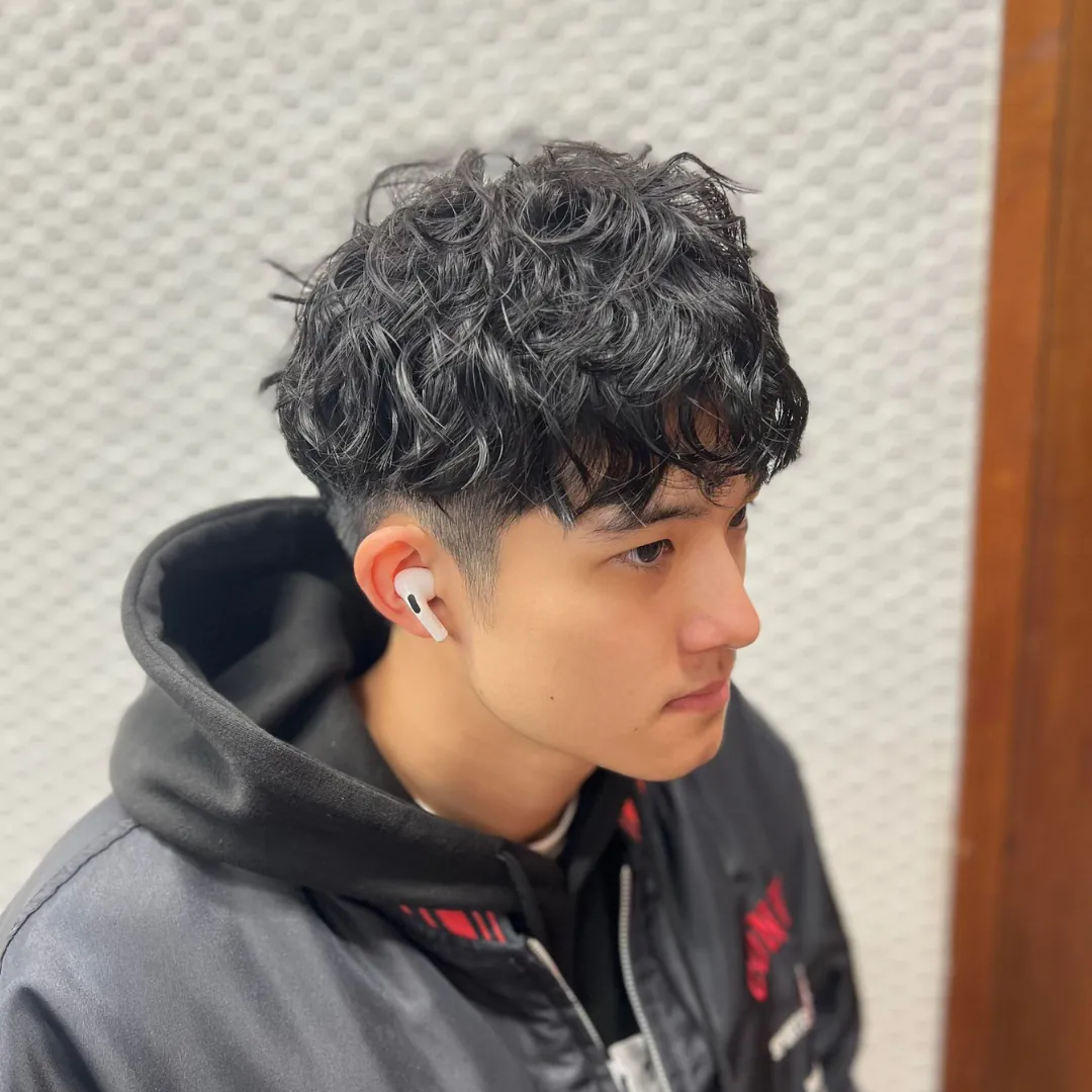 Nick's wool curls hairstyle work