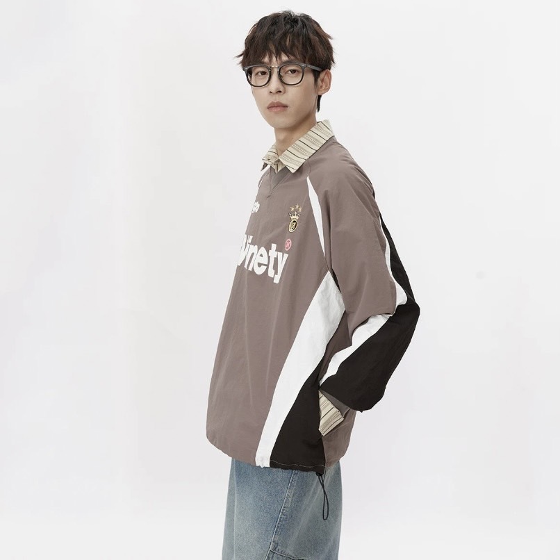 美式運動風拼接V領長袖上衣