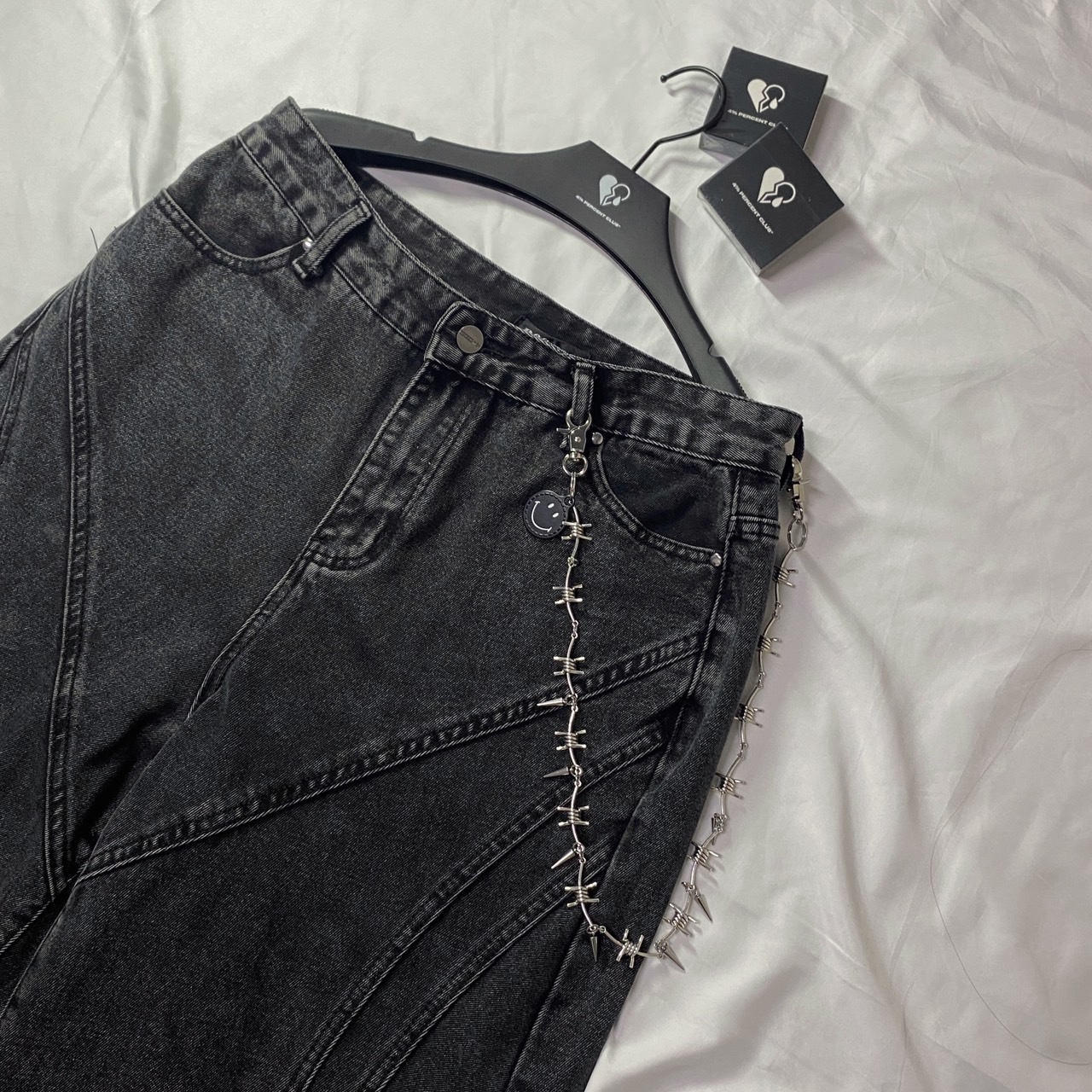 笑臉荊棘造型褲鍊