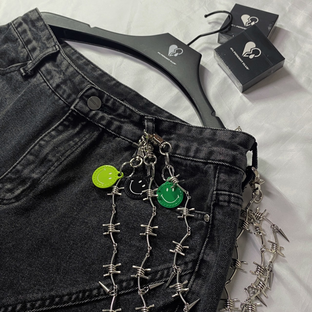 笑臉荊棘造型褲鍊