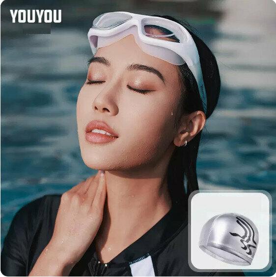 Hot selling swimming goggles and cap set (transparent white + PU bird swimming cap)