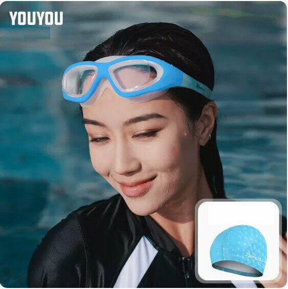 Hot selling swimming goggles and cap set (transparent blue + blue PU cap)
