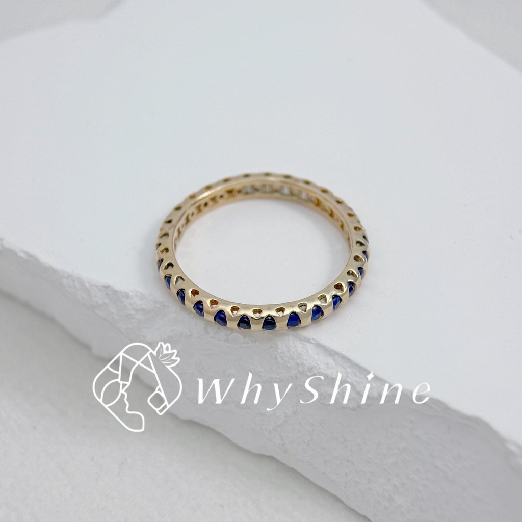 玫瑰金藍寶石間隔環繞戒指