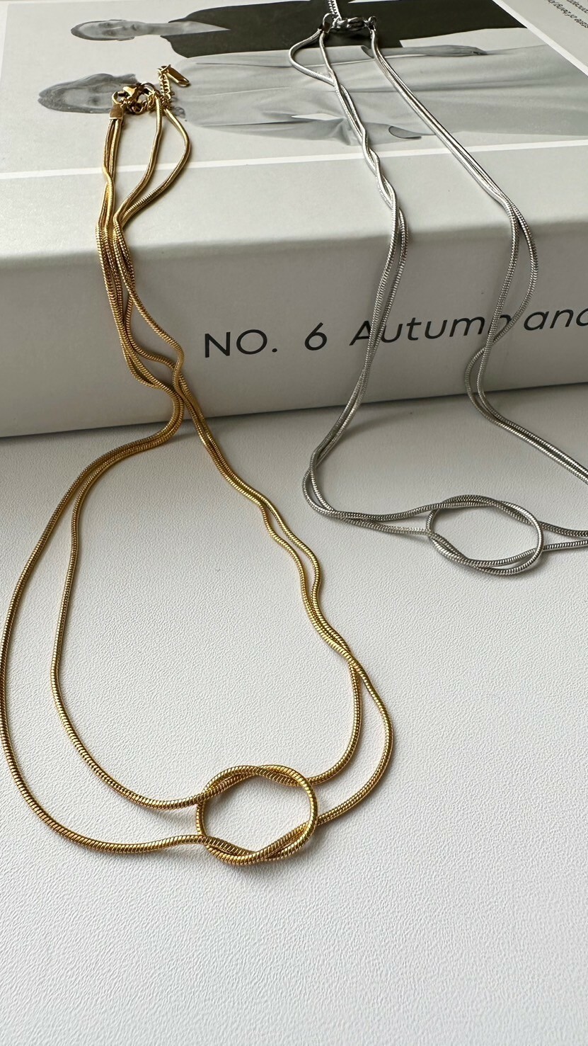 SS knot design necklace