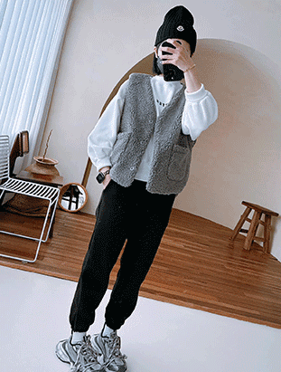 球球羊羔毛背心