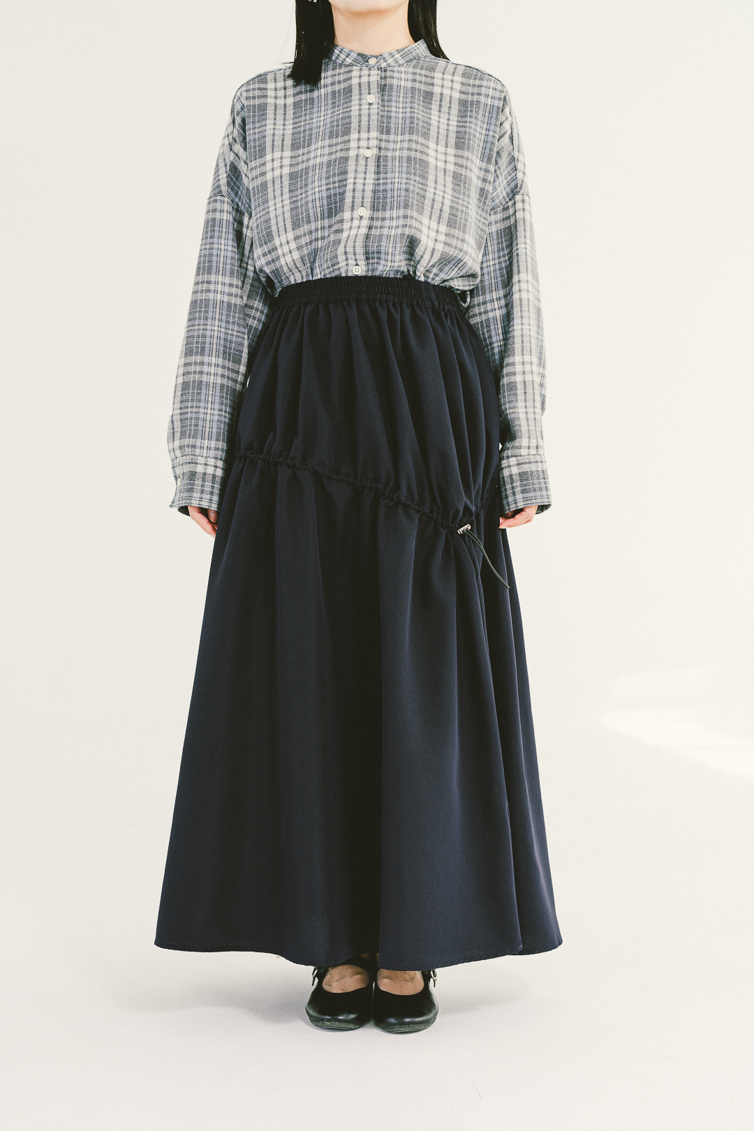 悠閒漫步！斜抽繩A字裙(兩色-黑藍)