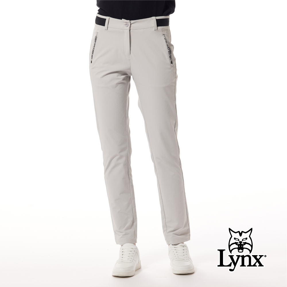 【Lynx Golf】抗UV防潑水數位印壓紋織帶剪接窄管九分褲