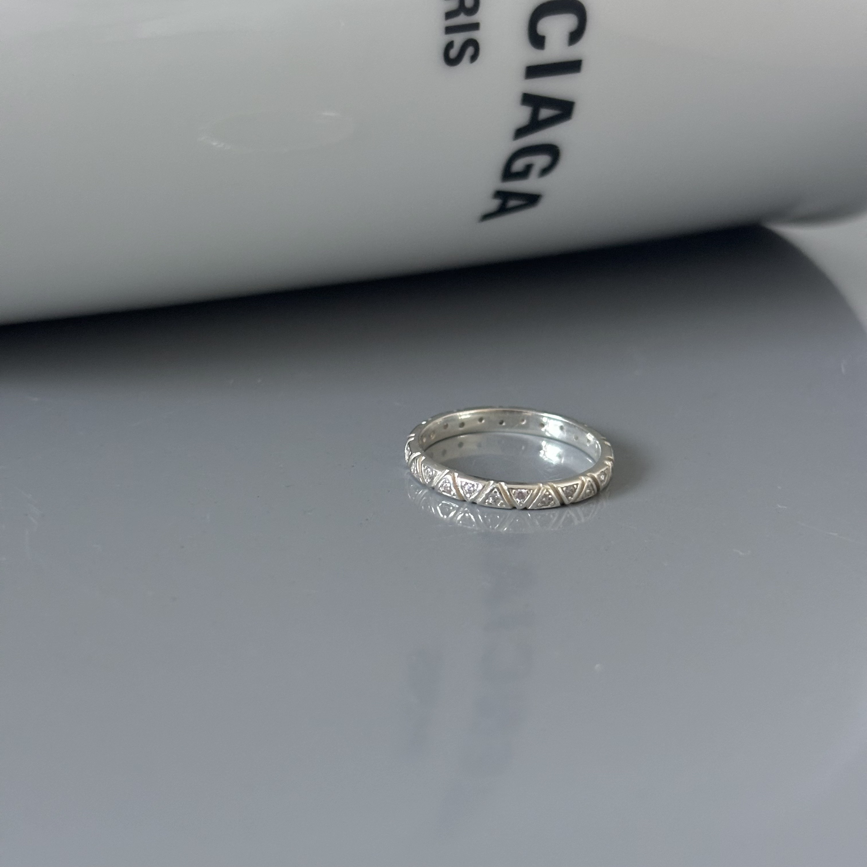 Triangle zircon band ring