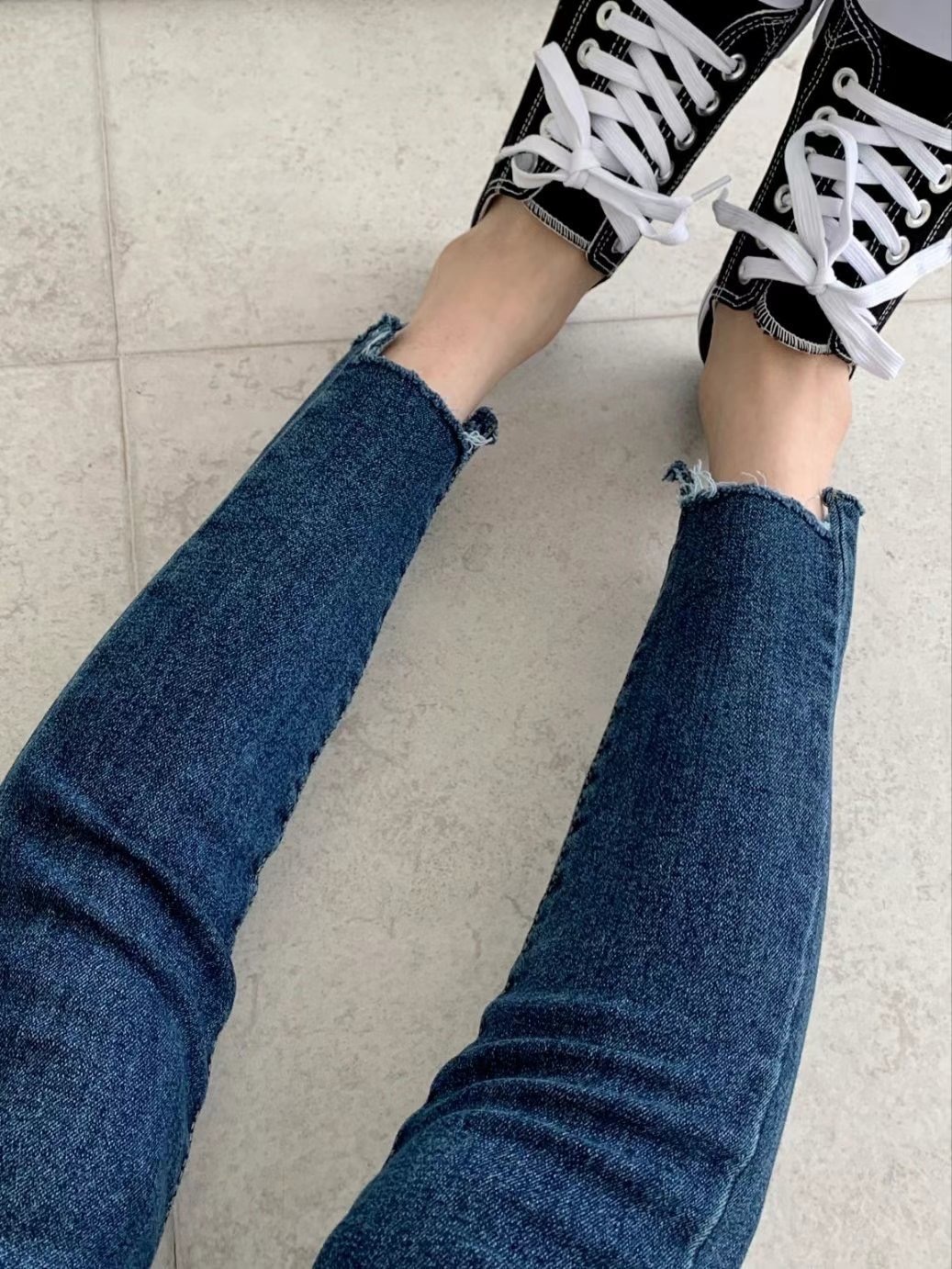 577褲腳缺塊牛仔長褲