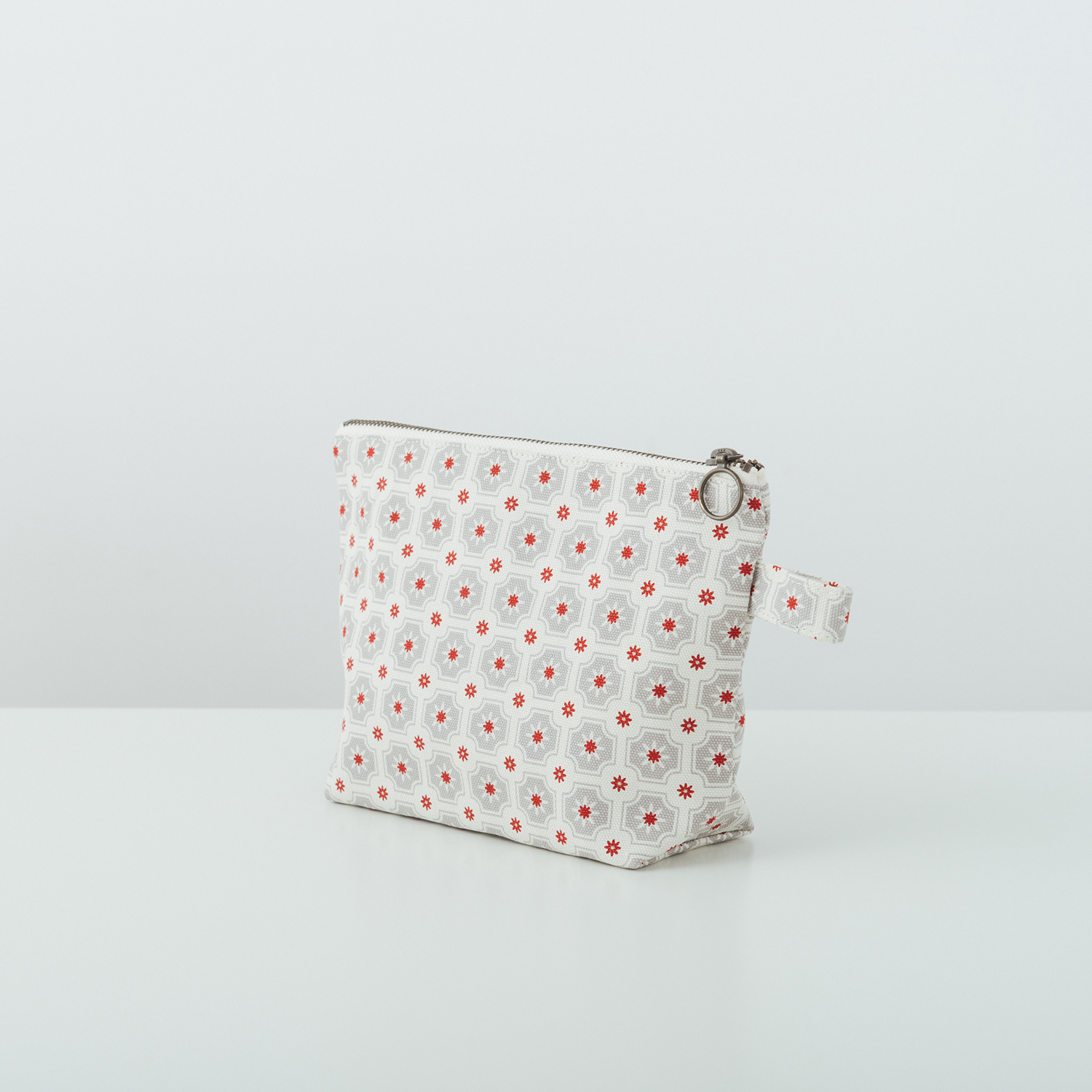 印花樂拉鏈梯形收納包老磁磚