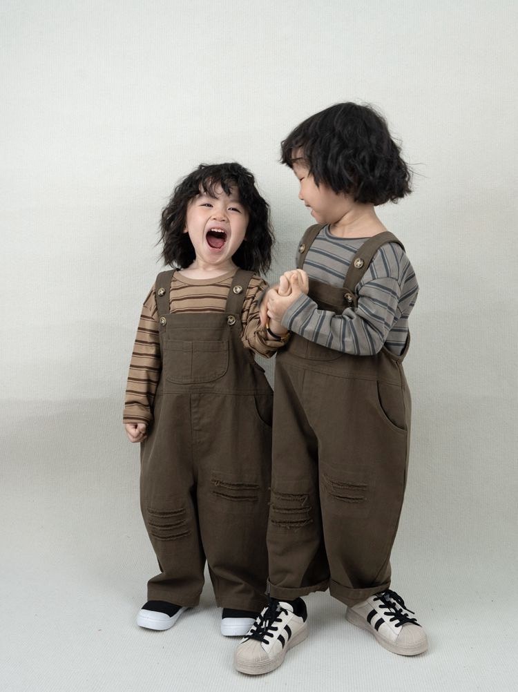 咖綠刷破吊帶褲