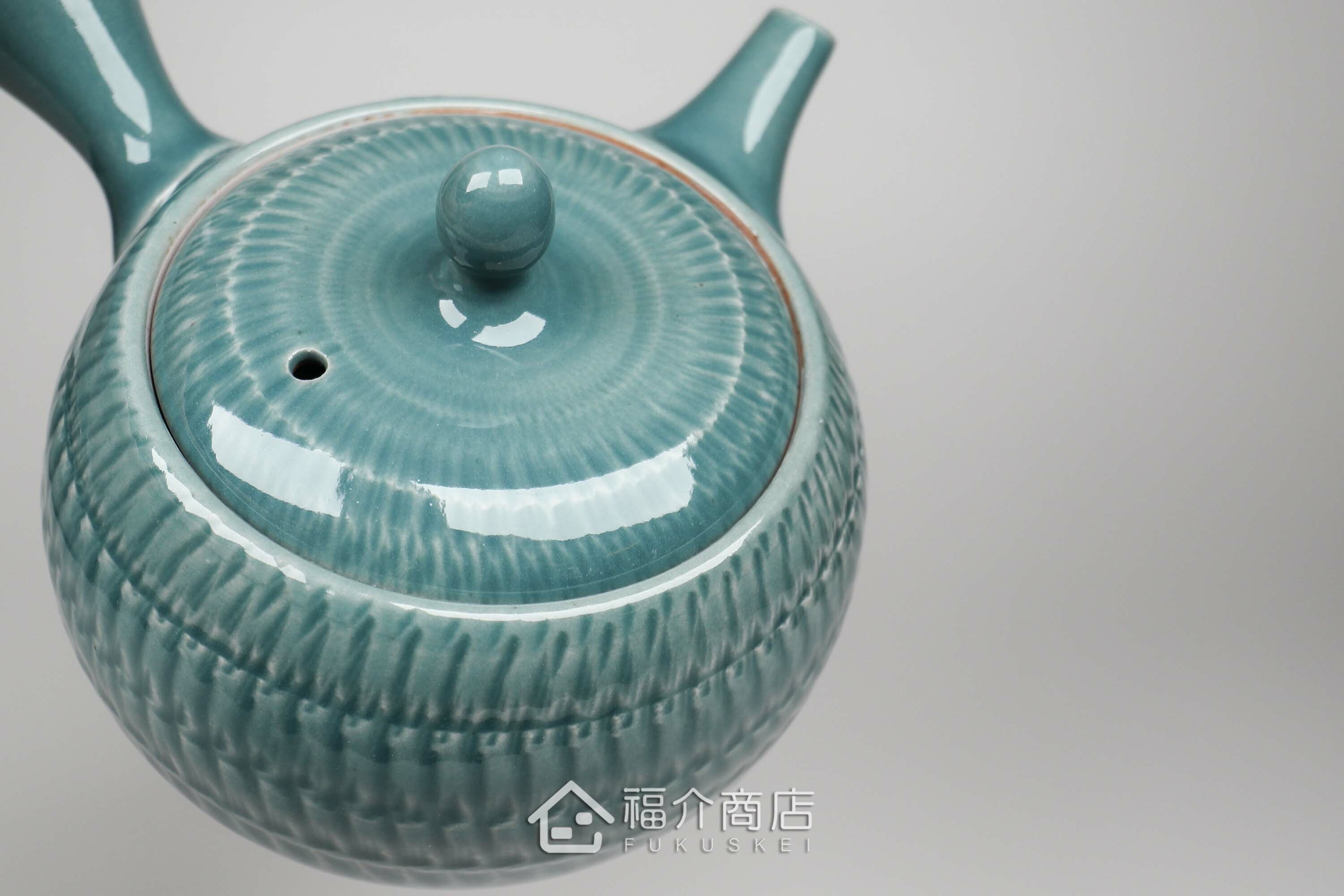 泡茶用的海洋藍色飛鉋造型日本陶壺