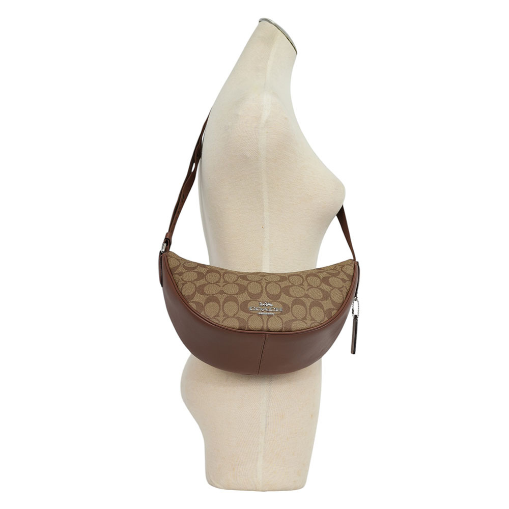 【COACH】Pace 銀字塗層帆布及牛皮半月型斜背包(卡其/焦糖色)CT643 SVWQ3