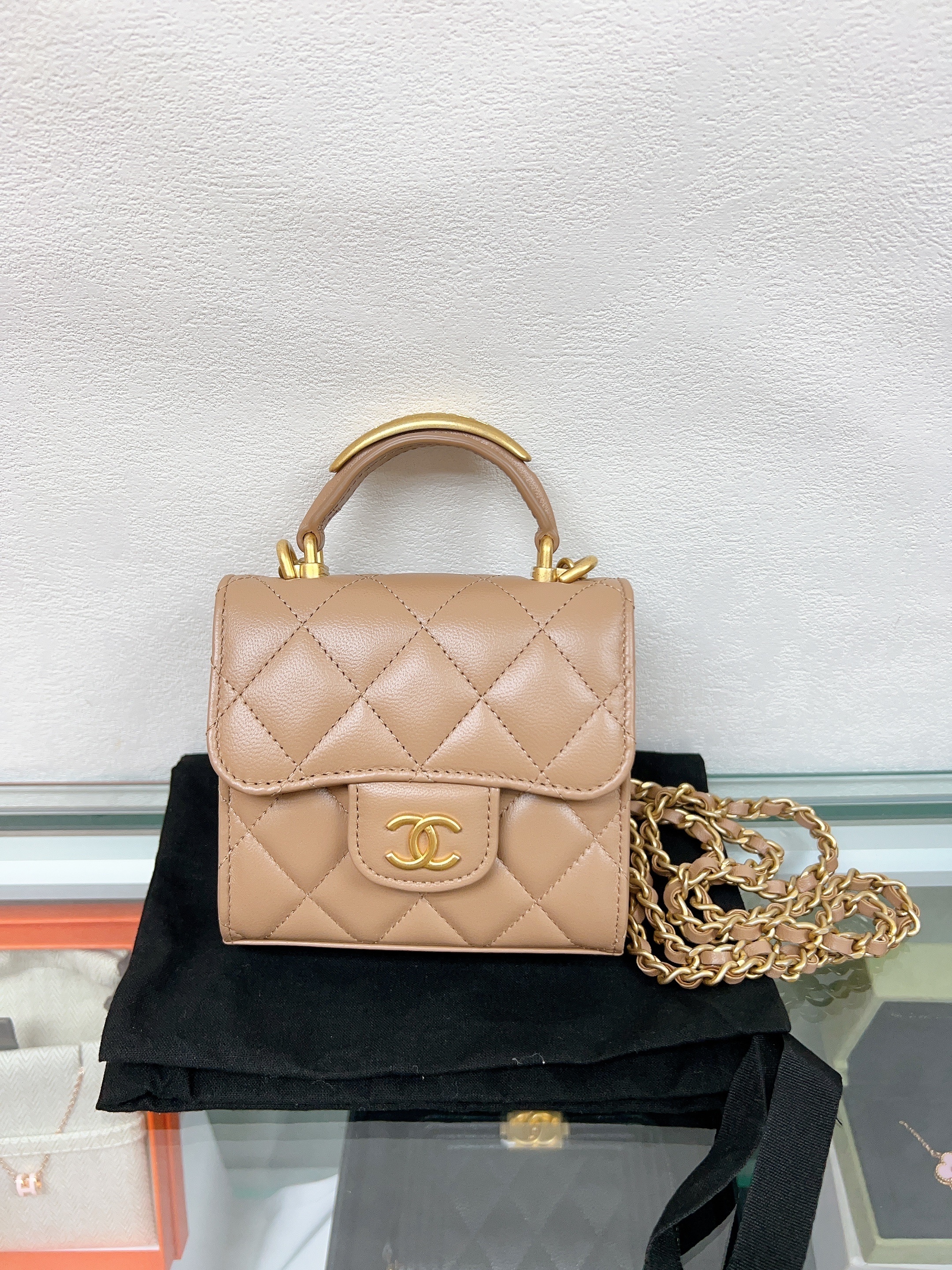 Chanel mini vanity pouch with handle (beige lambskin)