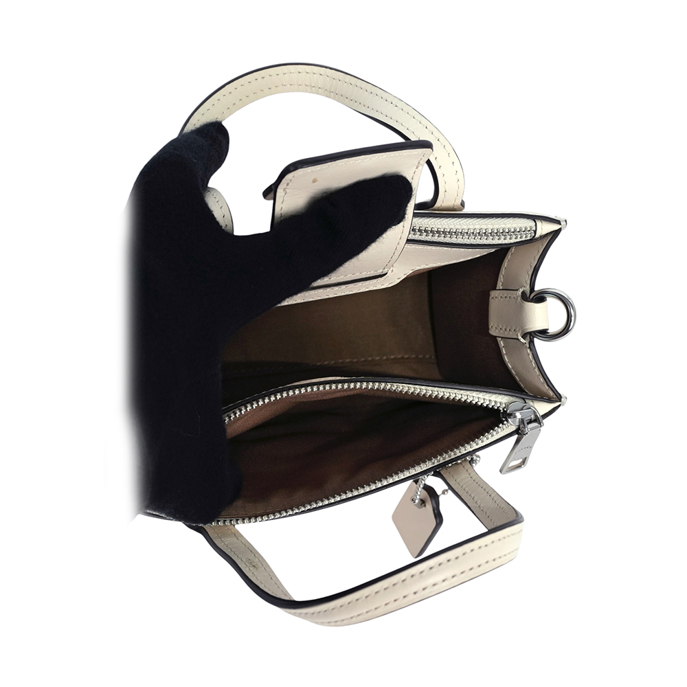 【COACH】Nina 銀釦縫線標誌小牛皮迷你手提/斜背二用包(白色)CT804 SVHA